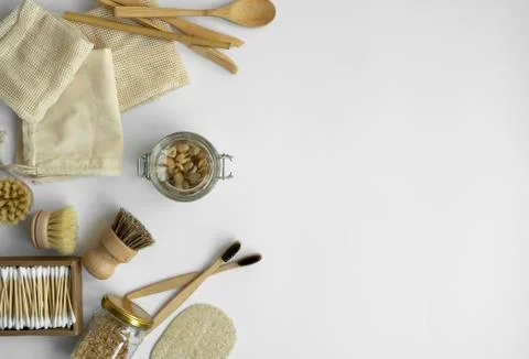 Zero waste kit. Set of eco friendly bamboo cutlery and cleaning brushes, mesh Stock Photos