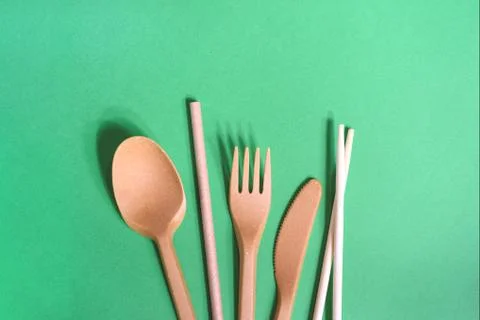 Zero waste kitchenware on the green background. Stock Photos