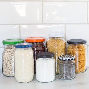 Zero waste plastic-free concept at home, different food in reused glass jars Foto stock