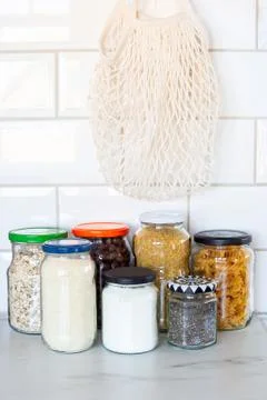 Zero waste plastic-free concept at home, different food in reused glass jars 스톡 사진