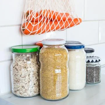 Zero waste plastic-free concept at home, different food in reused glass jars 스톡 사진