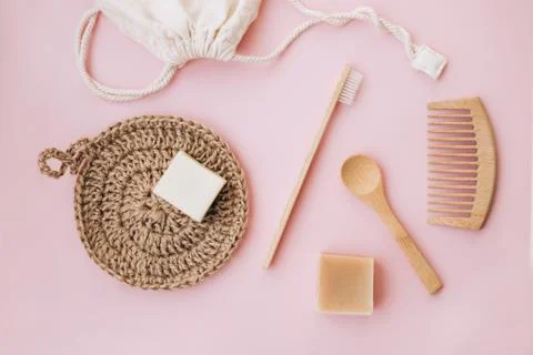 Zero waste set for bathing on light pink background. Stock Photos