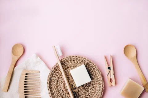 Zero waste set for bathing on light pink background. Stock Photos
