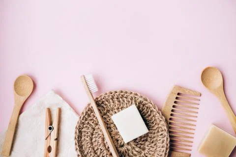 Zero waste set for bathing on light pink background. Stock Photos