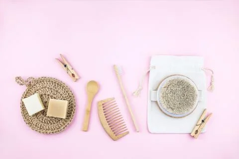 Zero waste set for bathing on light pink background. Stock Photos