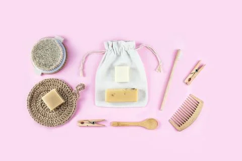Zero waste set for bathing on light pink background. Stock Photos
