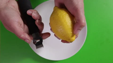 Zesting a lemon Stock Footage 63991283