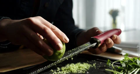 Zesting Lime On Microplane In Home Kitchen, Close Up - 4k Stock Footage 170196536