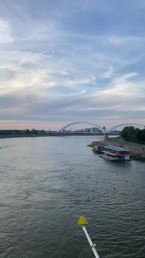 Zezelj Bridge Danube River panorama with speed boat, Novi Sad, Serbia Stock Footage 339480147