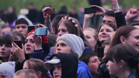 Zhytomyr, UKRAINE - April 2016: Young people dancing and enjoying music Stockbeeldmateriaal 70948604