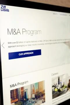 Ziff davis m and a program page for mergers and acquisitions 库存照片