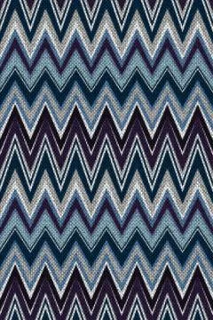 Zig-zag chevron knitted stripes in purple, blue, and grey. Seamless pattern. Stock Illustration