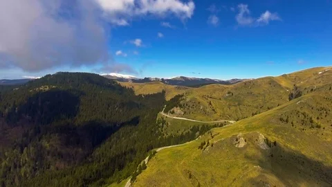 Zig zag mountain road in a cloudy day Stock Footage 75945082