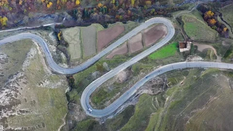 Zig-zag road in Kanbula forest park, Qinghai province Stock Footage 151990383