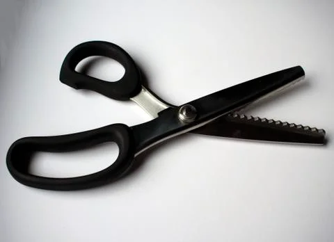 Zig zag sewing scissors on white background Stock Photos