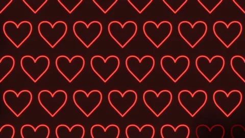 Zigzag love a repeating pattern of red hearts on a black background Stock Footage 303540279