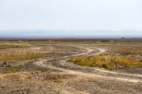 Zigzag path of wilderness zigzag path of wilderness, dirt road on gobi, wa... Stockfoto's
