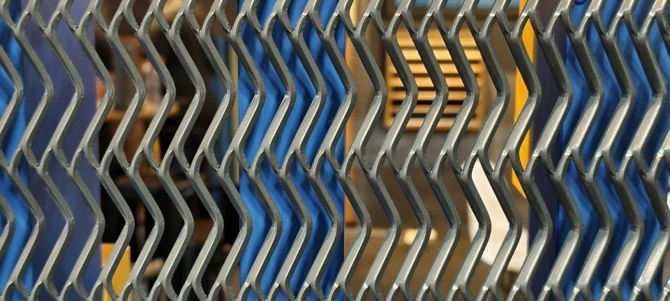 Zigzag-patterned metallic grille Stock Photos