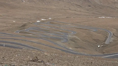 Zigzag road on mountain pass in Tibet, Friendship Highway China to Nepal Video stock 113017970