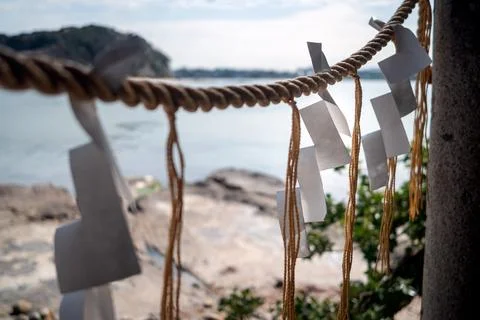Zigzag-shaped paper streamers called shide hanged at Japanese shrines and te Stock Photos