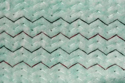Zigzag-textured green surface offers a unique visual delight Stock Photos