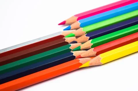 Zigzagged arrangement of two different row of different color wood pencil cra Stock Photos