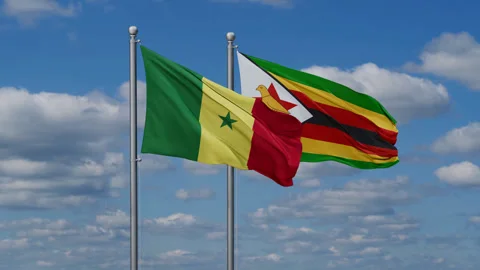 Zimbabwe and Senegal two flags Stock Footage 285723126
