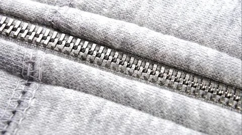 Zip on gray fabric jacket Stock Photos