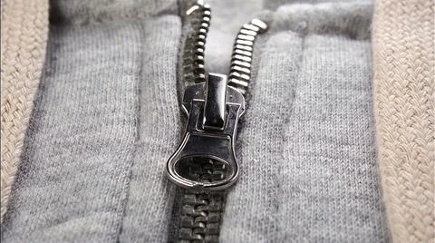 Zip on gray fabric jacket Stock Photos