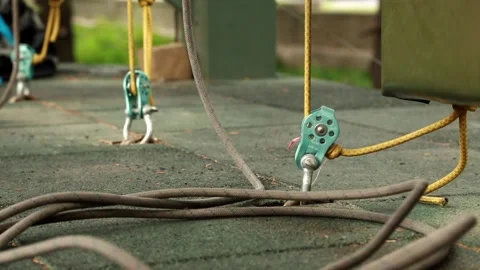 Zip line base equipment, ropes, netting, soft floor covering, block rollers Stock Footage 248528410