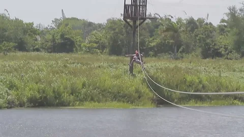 Zip line over river Stock Footage 88226212