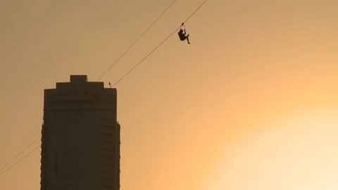 Zip line / zip wire in front of the Burji Khalifa Stock Footage 112942112
