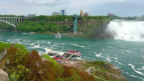 Zip Liners Enjoying Panoramic View of Niagara Falls (from Canadian Side) Stock Footage 91636771
