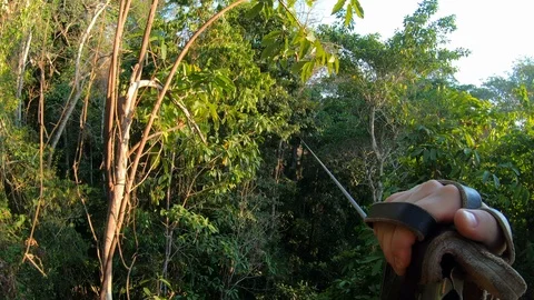 Zip lining through the jungles of Costa Rica Stock Footage 108572062