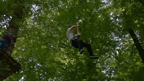 Zipline Ride in the forest Stock Footage 94502282