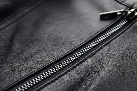 A zipper on black leather Stock Photos