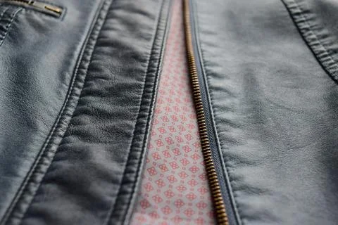 Zipper on blue leather Stock Photos