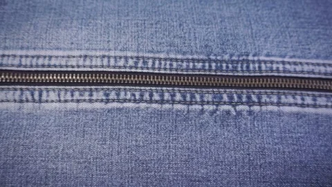 Zipper close up. Jean jacket. Jeans background 動画素材 284745732