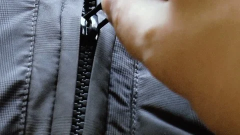 Zipper closure on the jacket Stock Footage 79409061