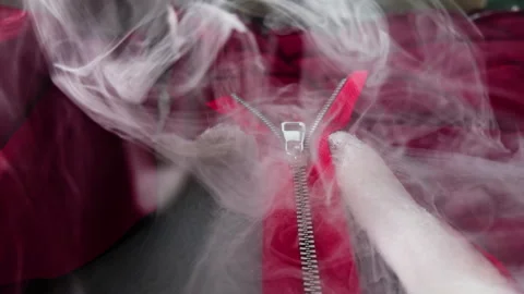 Zipper on Fabric in Smoke Stock Footage 305352044
