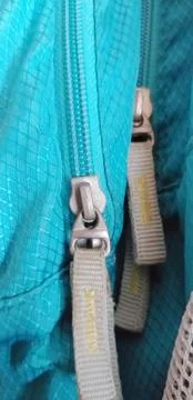 Zippers on a backpack, closeup, macro. Stock Photos