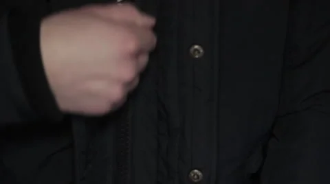 Zipping up coat Stock Footage 40484680