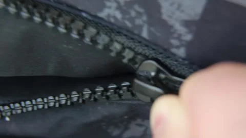 Zipping up the jacket. Dressing of the upper warm clothes. Stock Footage 242520042