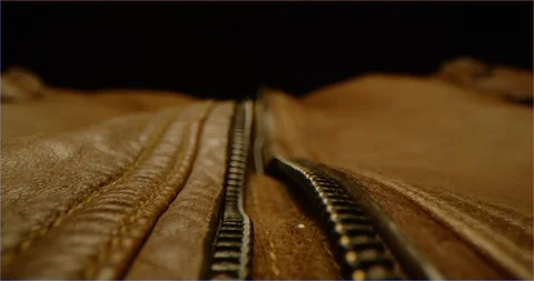 Zipping up a leather jacket macro shot Stock-Footage 126266325