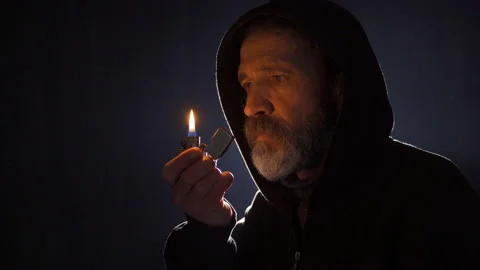 The Zippo lighter man. To set fire, to explode. Stock Footage 227574976