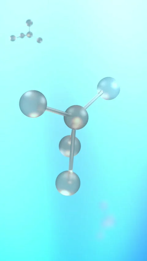 Zirconium Molecule or Particle Spinning over Blue Background - Vertical Stock Footage 339638644