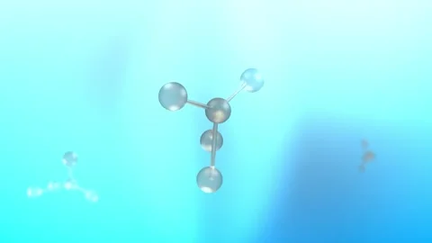 Zirconium Molecule or Particle Spinning over Blue Background Stock Footage 339638648