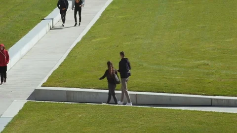 Zlin -  Elevated view of city park with people passing by. 4K resolution. Stock Footage 116504239