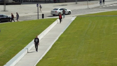 Zlin -  Elevated view of city park with people passing by. 4K resolution. Stock Footage 116504455