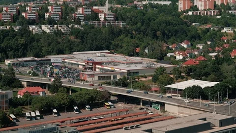 Zlin -Elevated view of city. Traffic on busy road, bus station and shopping mall Stock Footage 122572233